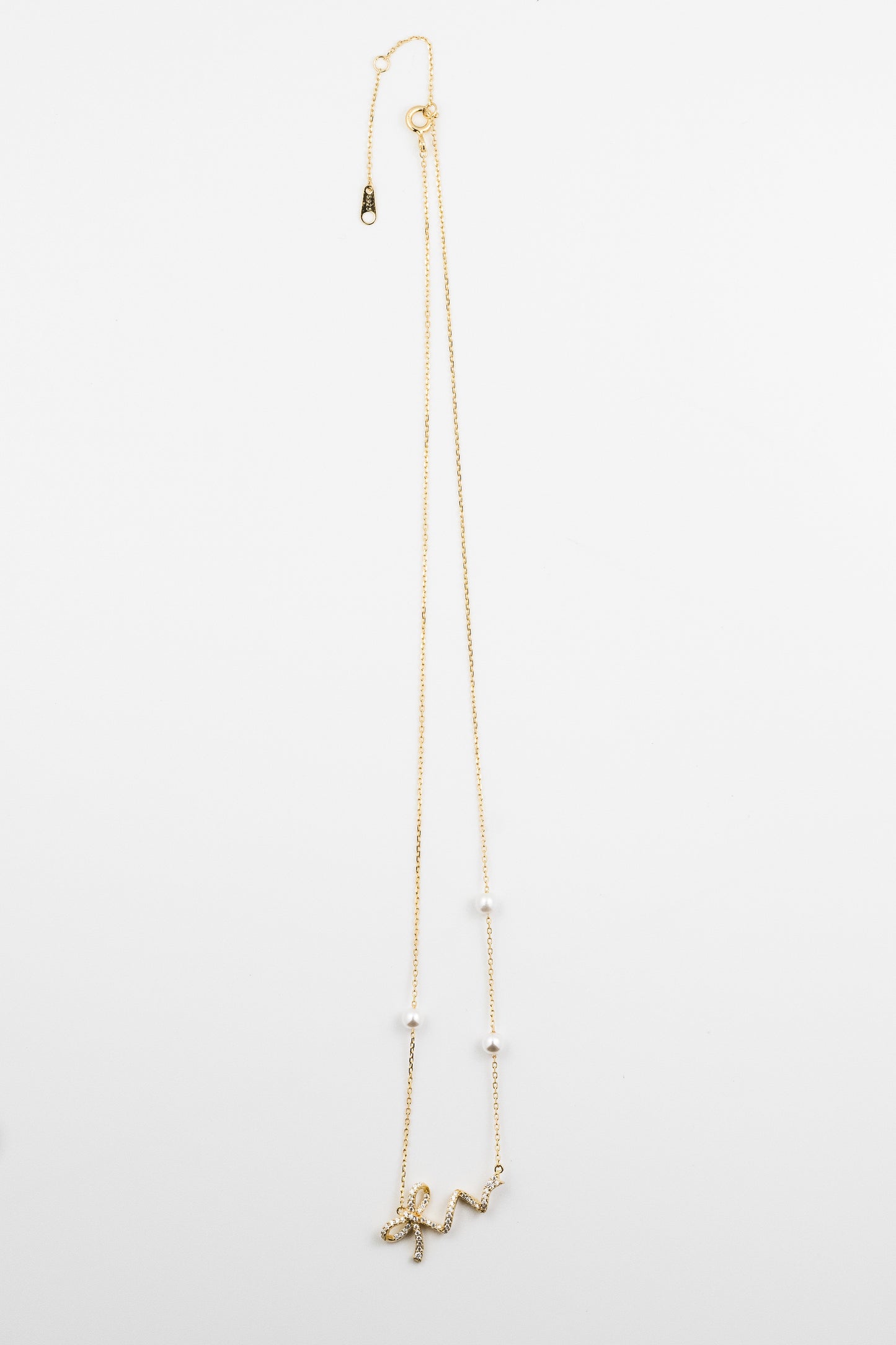 Golden Ribbon Pearl Charm Necklace