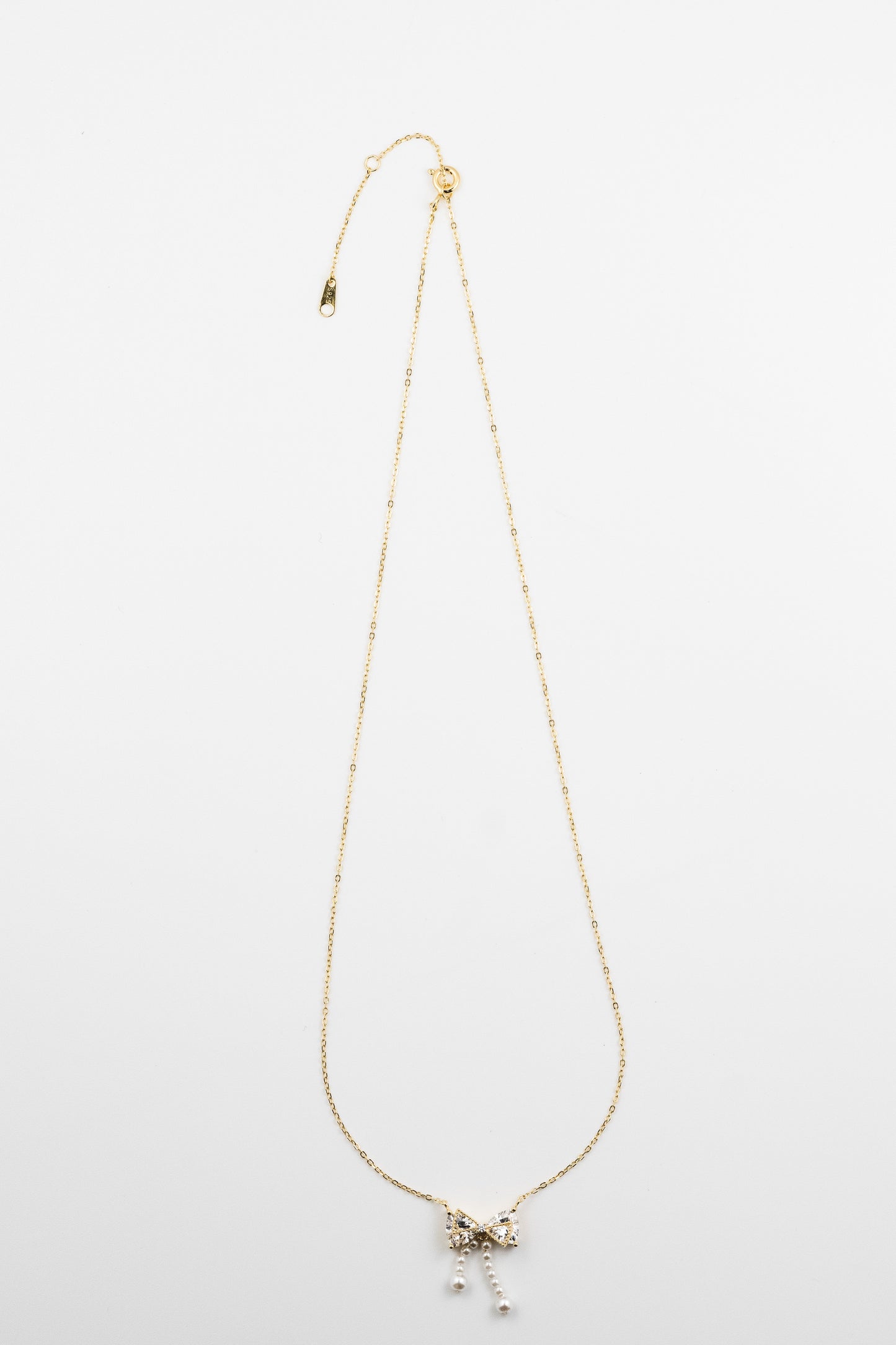 GlamBow Pearl Tassel Necklace